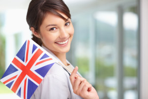 Pretty young female with Great Britain's flag